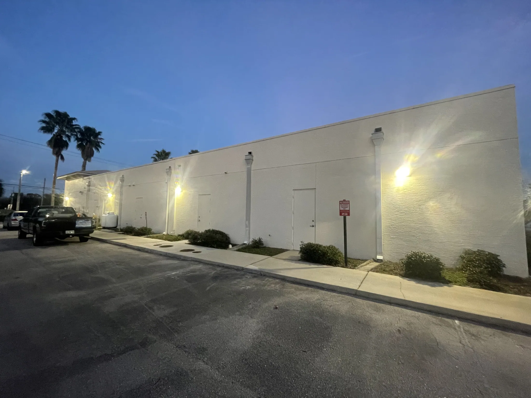 Commercial warehouse exterior at night