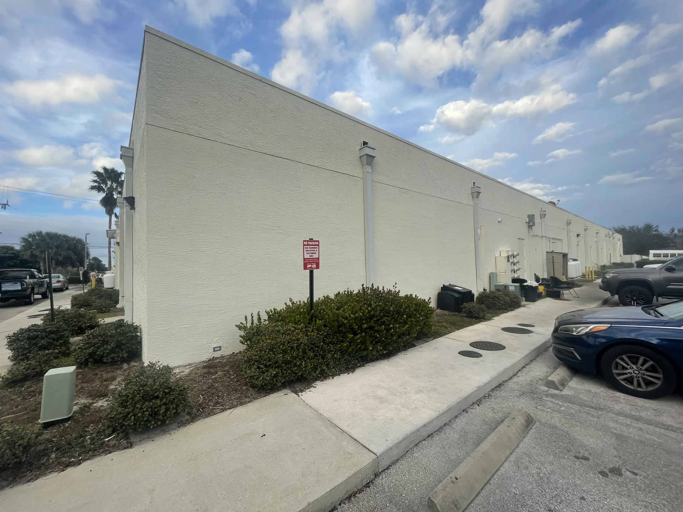 Parking lot outside a commercial warehouse