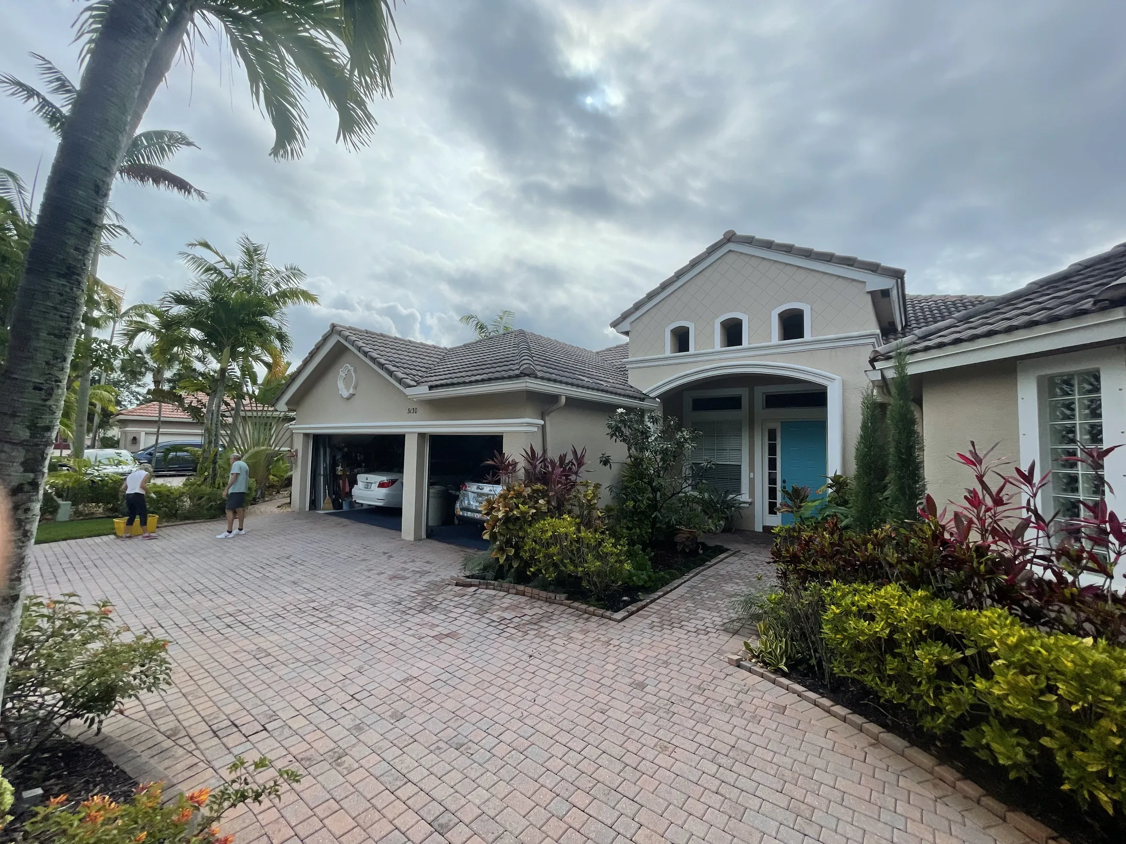 Paver driveway and home viewed from the front