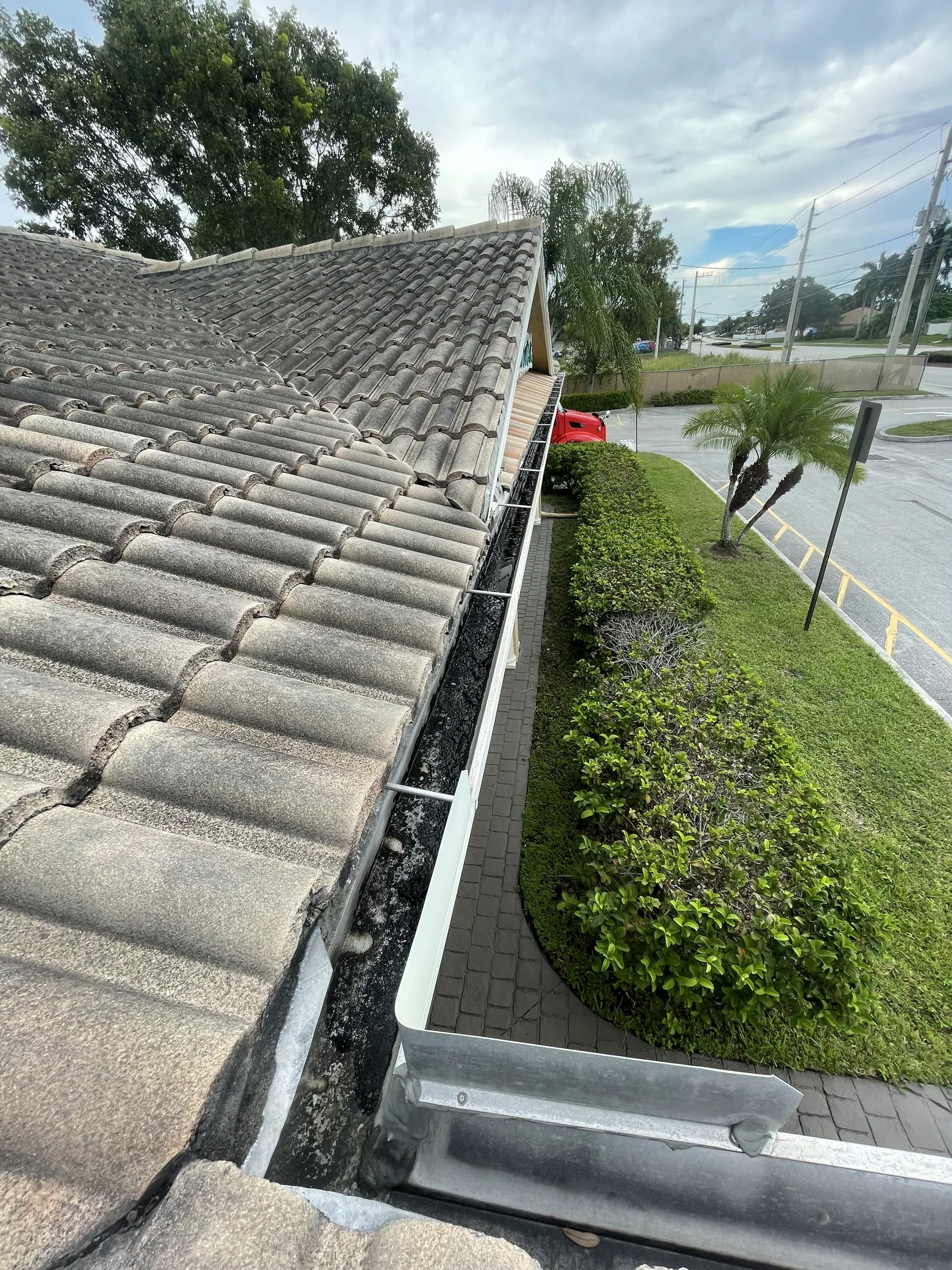 Roofline gutter and downspout detail